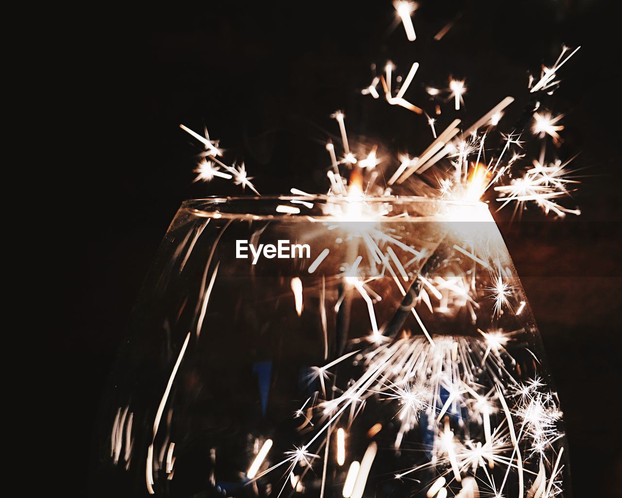 CLOSE-UP OF FIREWORKS IN NIGHT