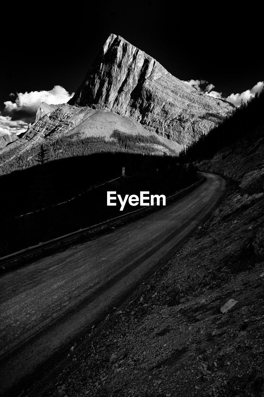 Road on mountain against sky