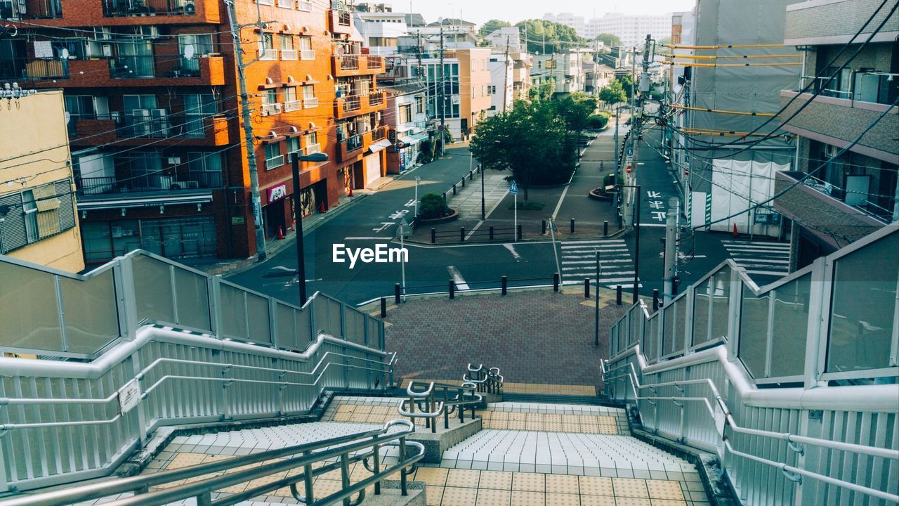 Empty steps leading towards city street