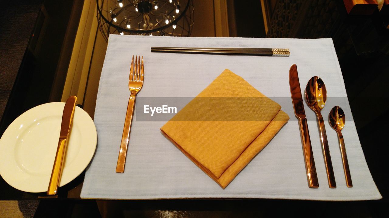 Close-up of place setting on table