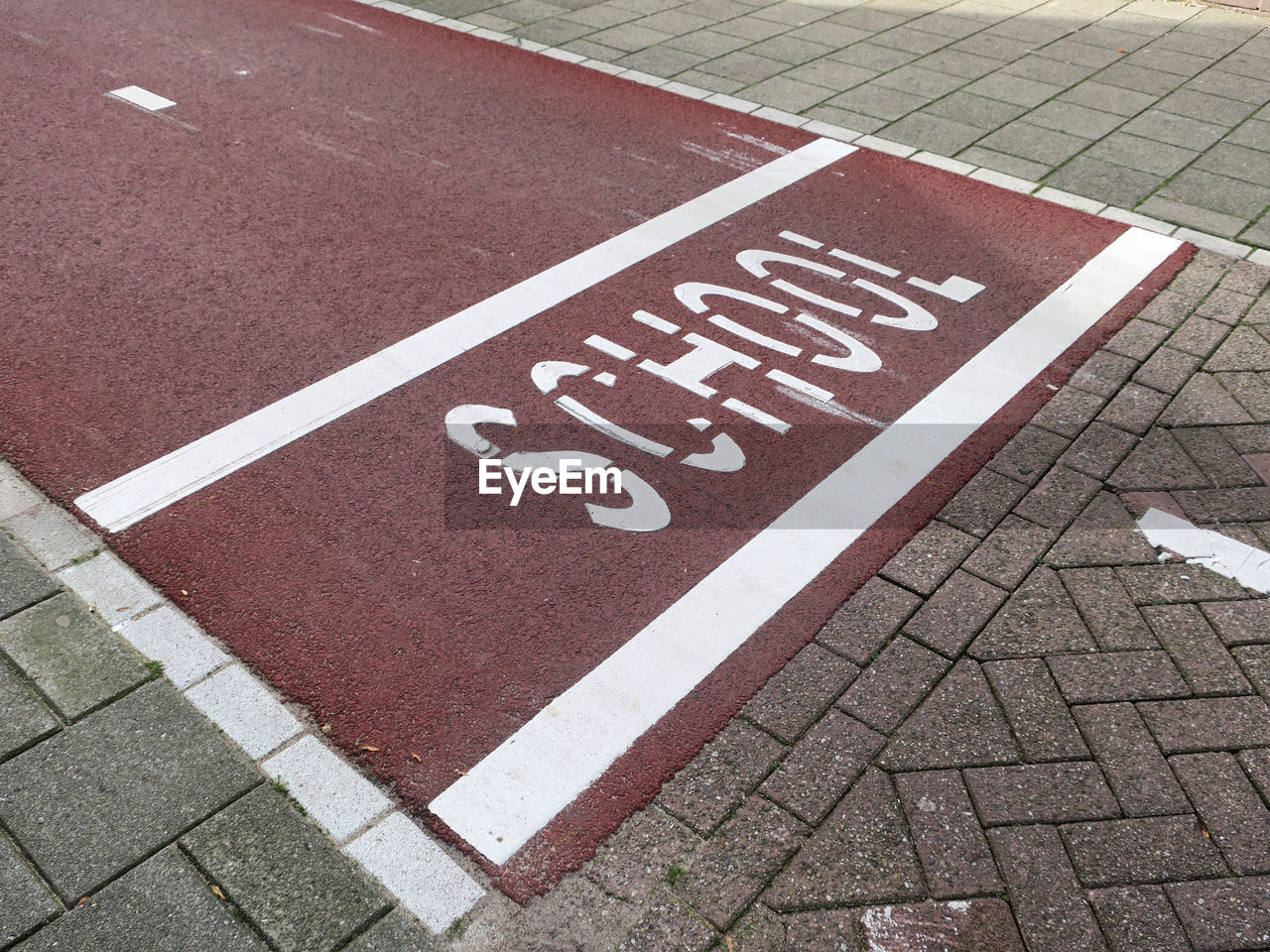 High angle view of school text on road