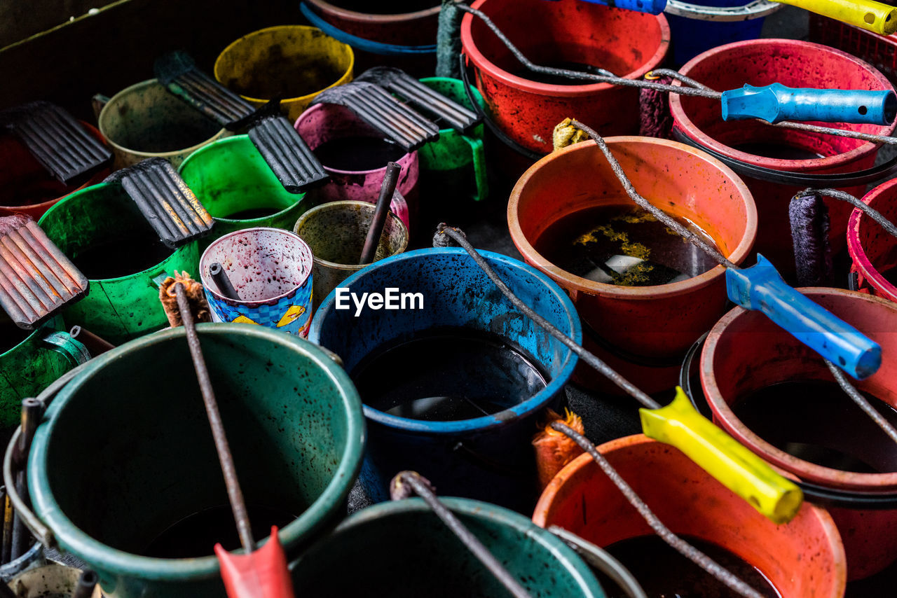 High angle view of colorful buckets