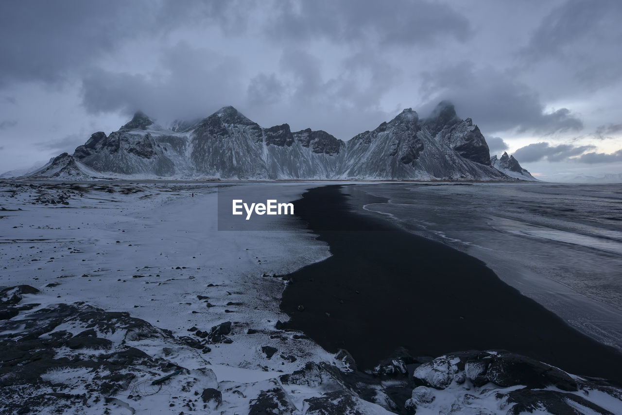 Vestrahorn and its black sand beach in iceland.sand dunes on the stokksnes on southeastern icelandic 