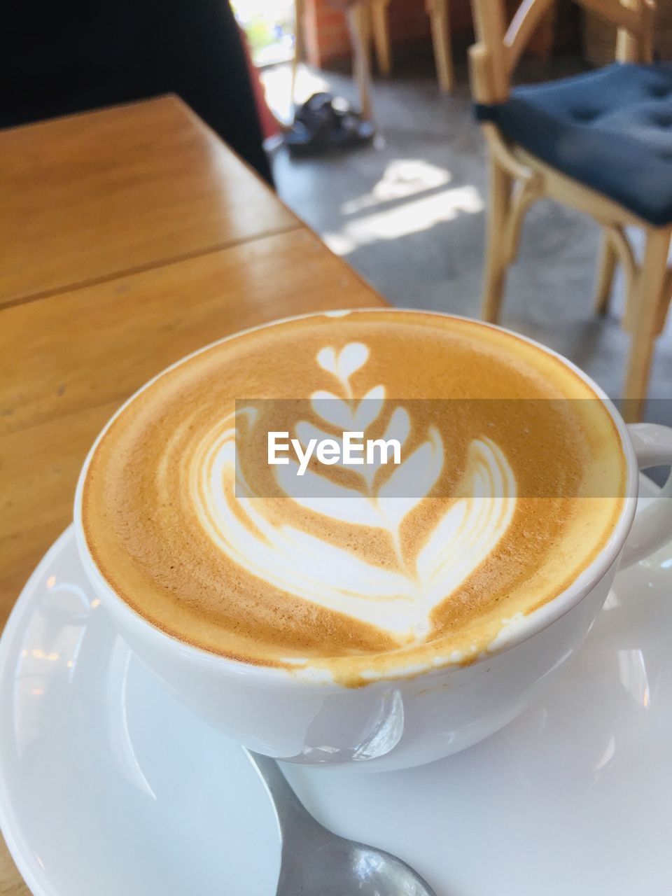 CLOSE-UP OF COFFEE SERVED ON TABLE