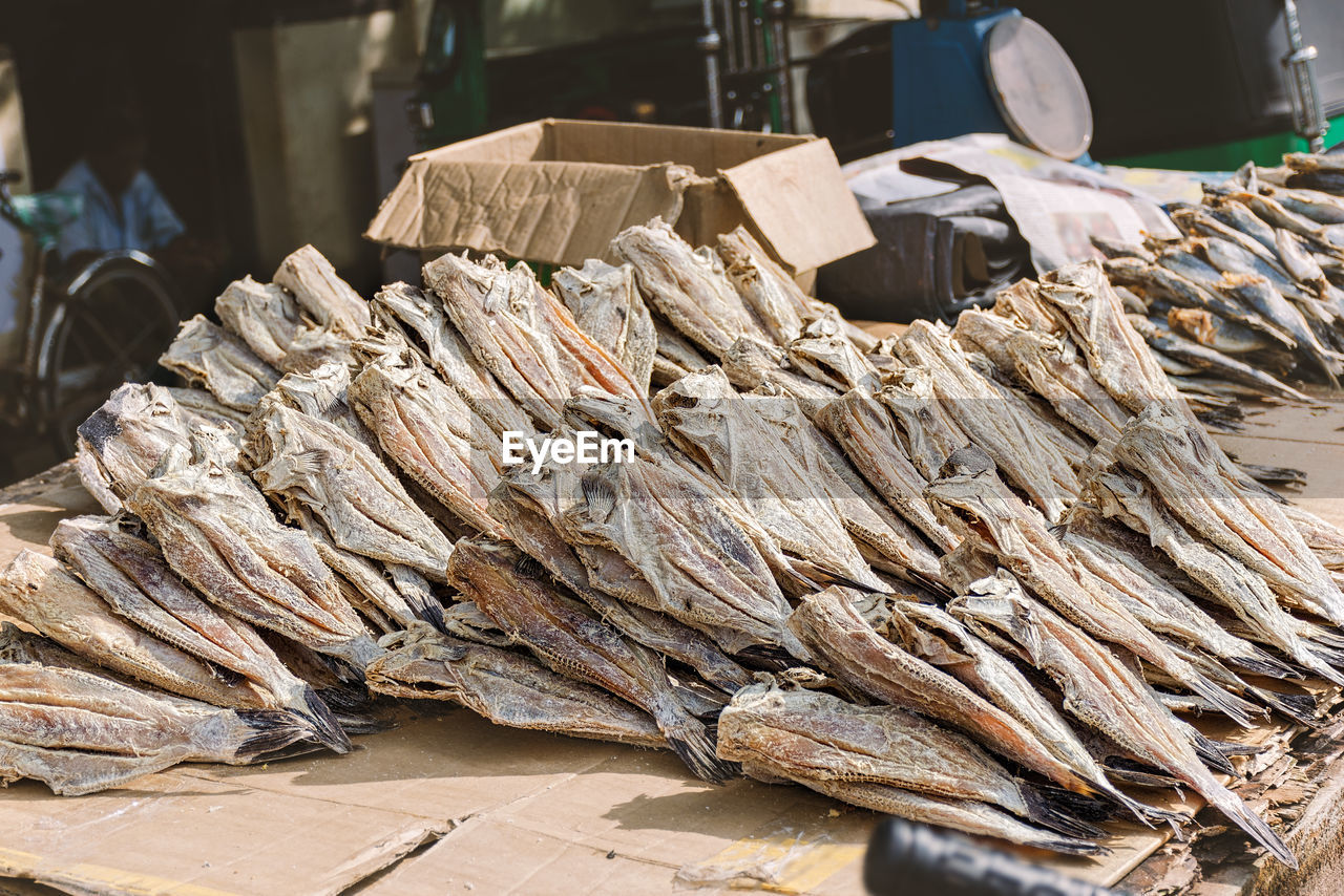 Local street market, dried salted fish stall. 