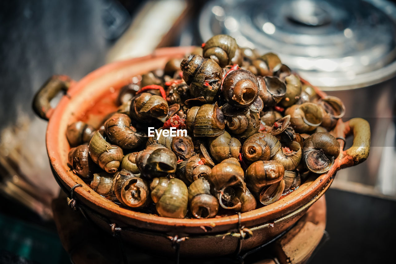 CLOSE-UP OF CRAB IN BASKET