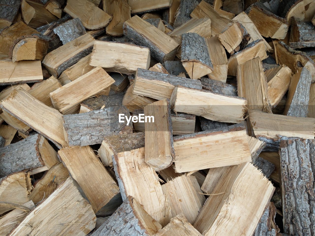 FULL FRAME SHOT OF LOGS