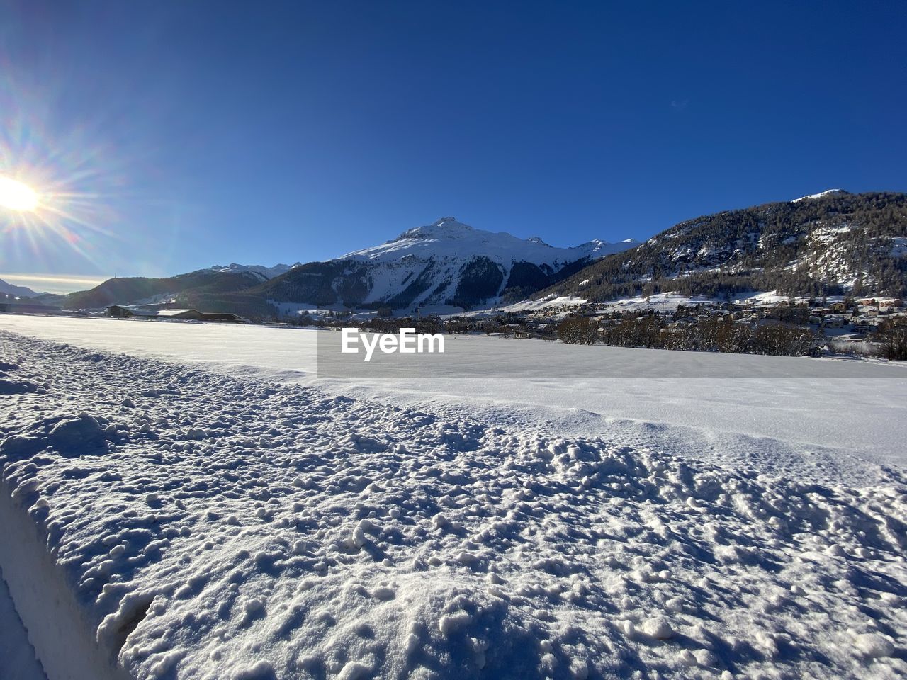 SCENIC VIEW OF SNOWCAPPED MOUNTAINS AGAINST CLEAR SKY DURING WINTER