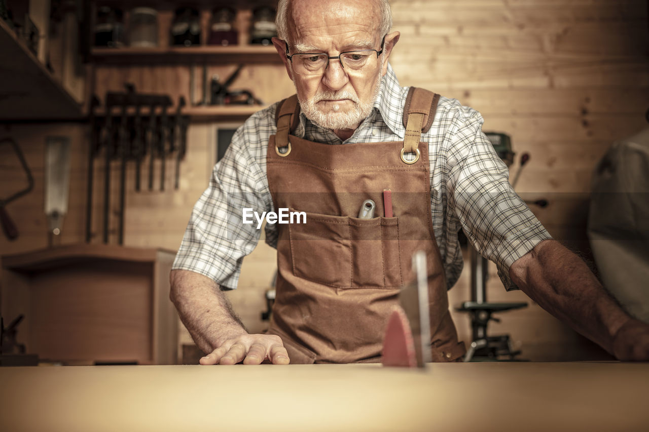 Man working on wood