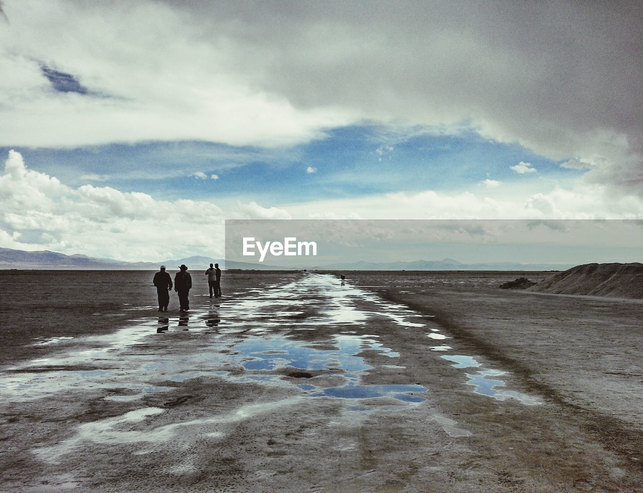 VIEW OF SEA AGAINST CLOUDY SKY