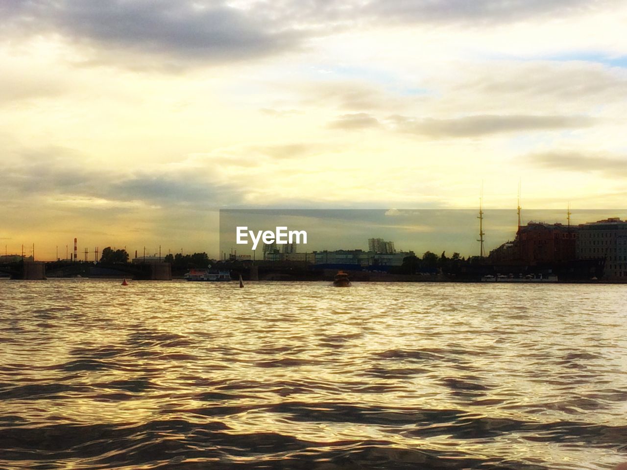 VIEW OF RIVER AT SUNSET