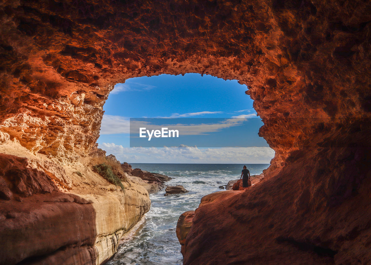 SCENIC VIEW OF SEA SEEN THROUGH ARCH