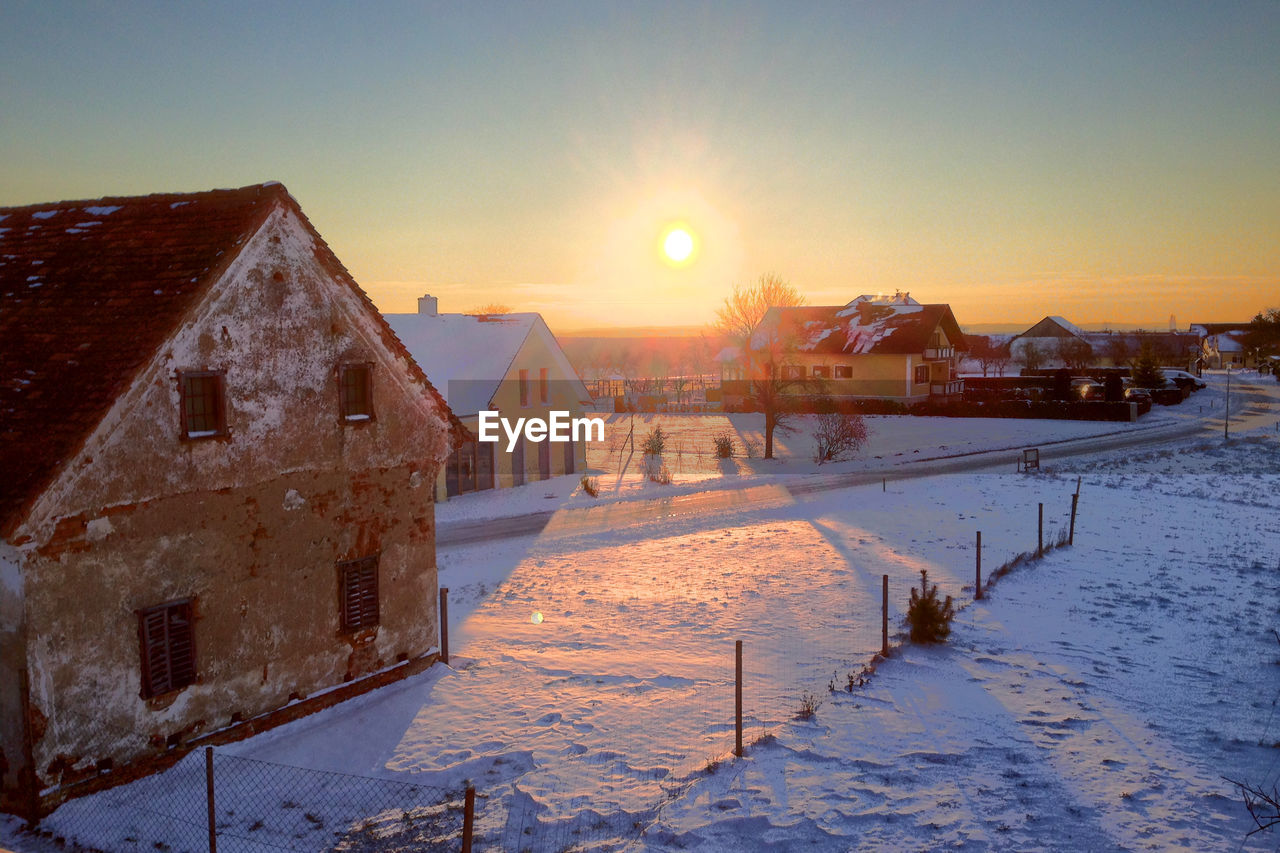 Scenic view of sunset over town