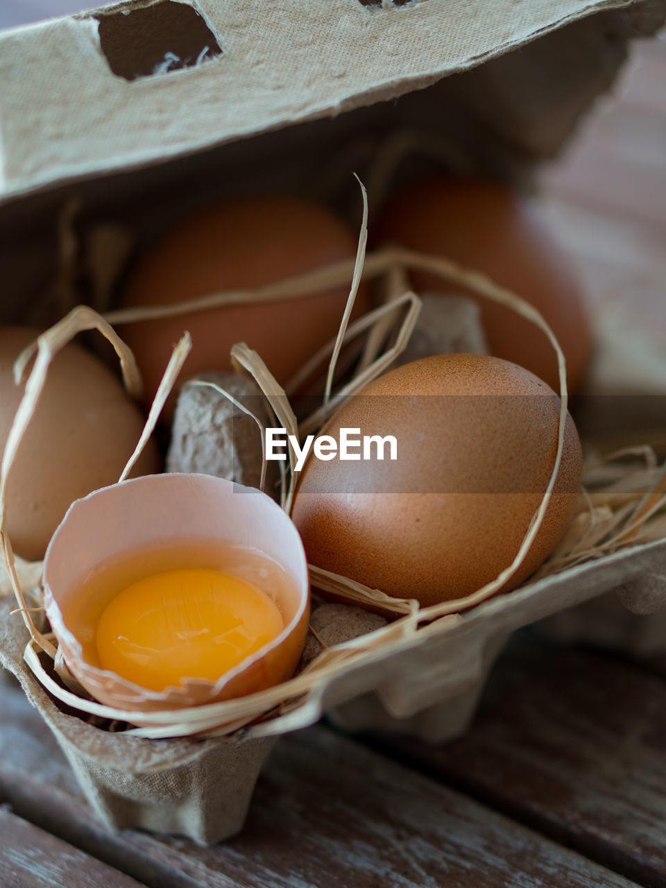 High angle view of eggs in container on table