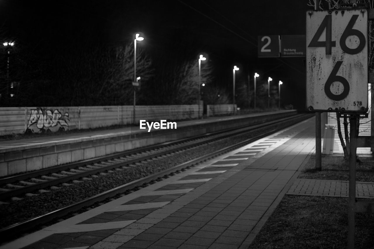 RAILROAD TRACKS AT NIGHT