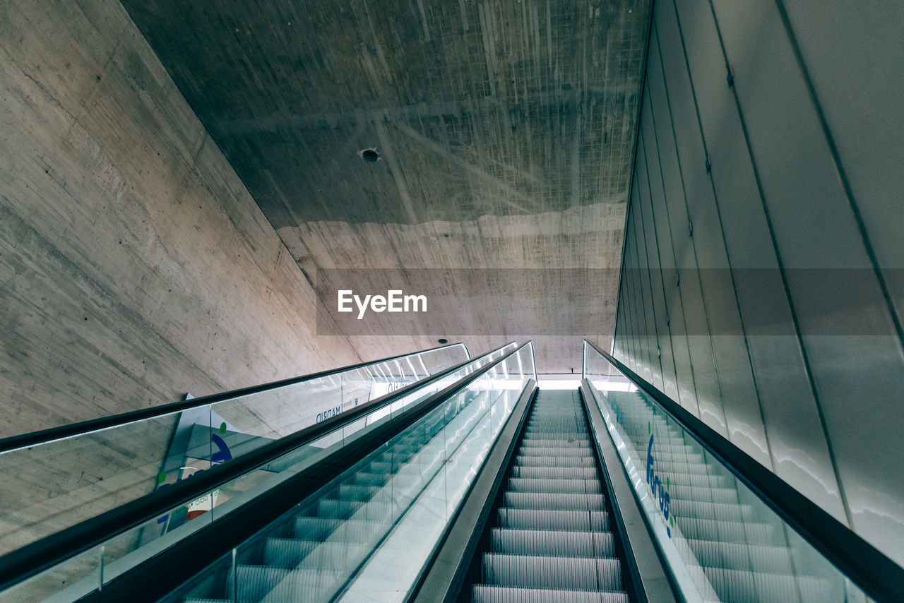 Low angle view of escalators at subway station 