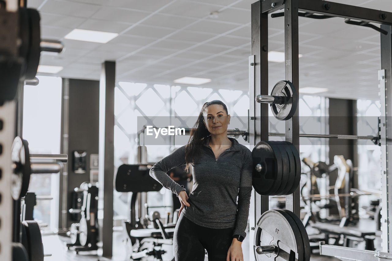 Woman standing in gym