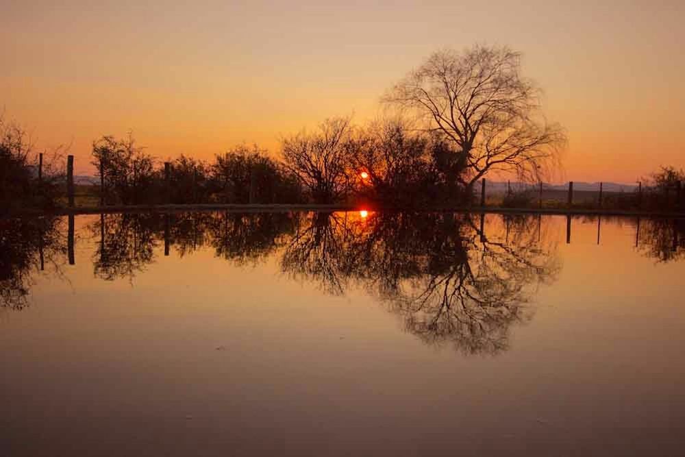 SUNSET OVER LAKE