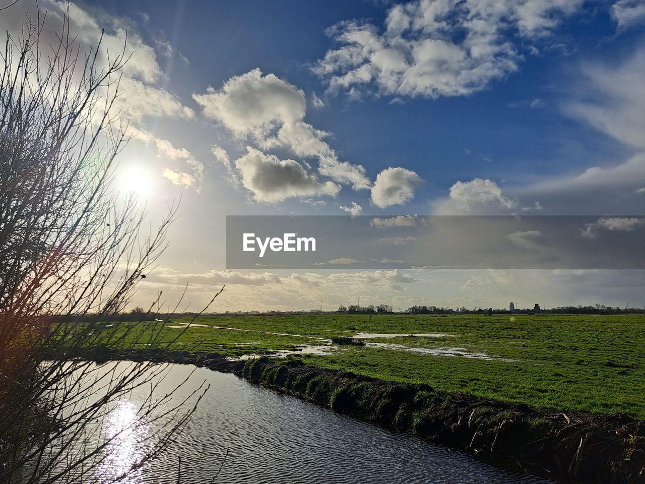 reflection, sky, sunlight, water, cloud, nature, morning, no people, environment, beauty in nature, scenics - nature, tranquility, plant, outdoors, tree, lake, light, horizon, day, landscape, tranquil scene, land