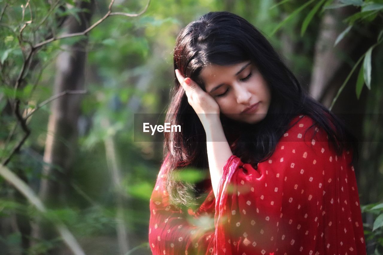 Beautiful young woman in a forest