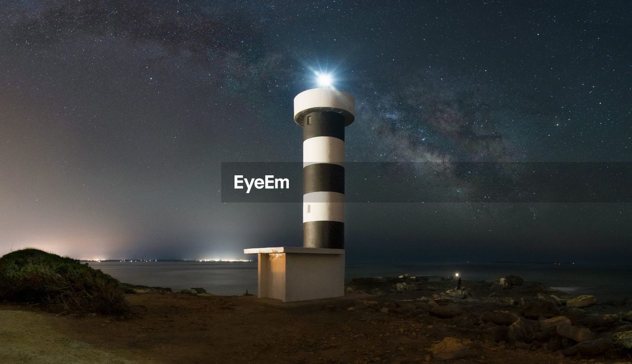 Scenic view of sea against sky at night