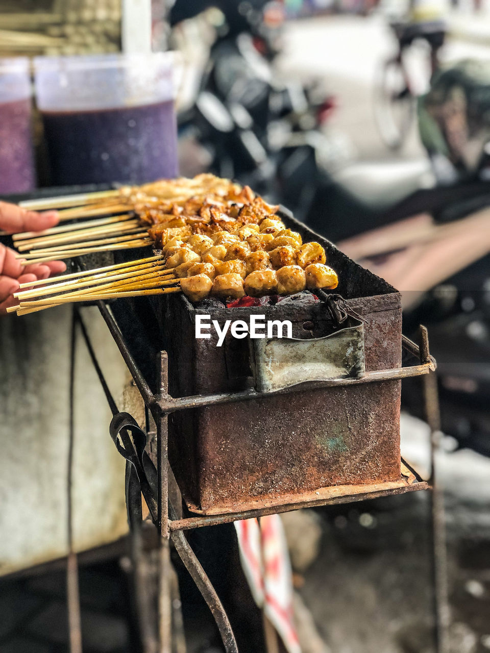 Grilled meatballs, street food from indonesia, with a spicy and sweet flavors