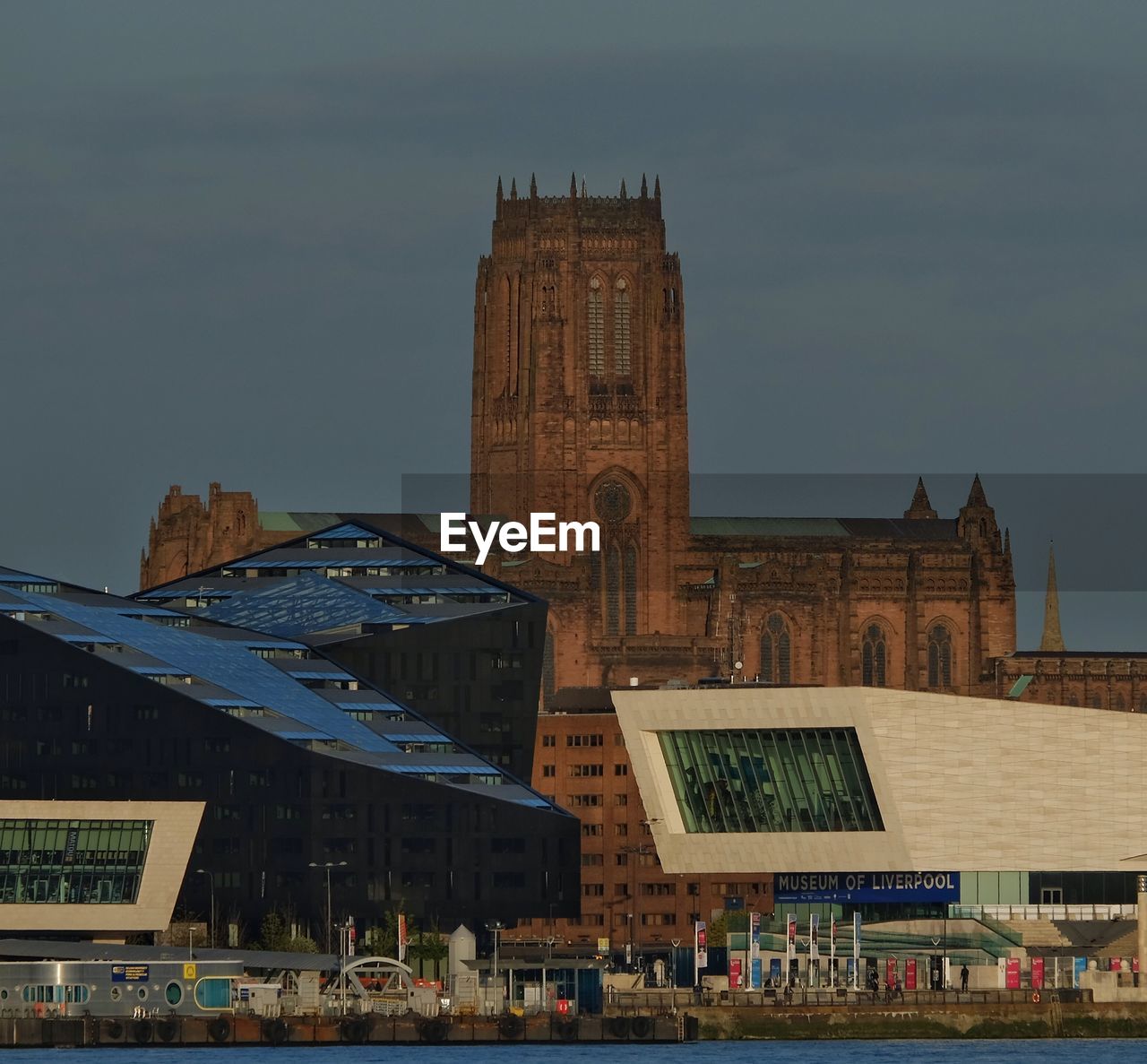 Low angle view of liverpool cathedral against clear sky at dusk