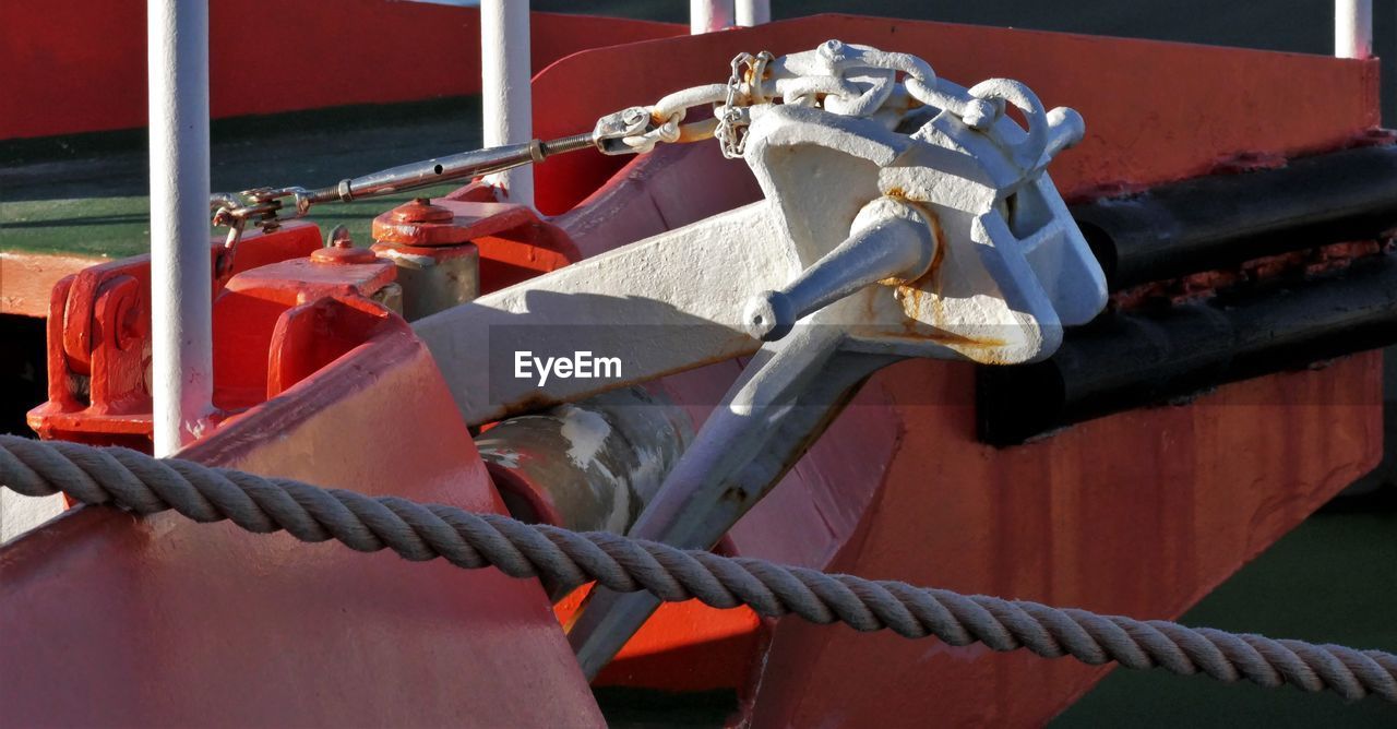 Close-up of rope tied to bollard