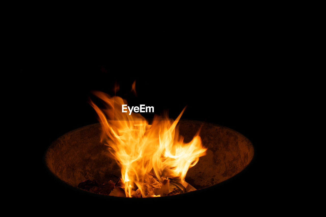 flame, burning, fire, heat, campfire, nature, darkness, no people, black background, glowing, night, orange color, copy space, wood, close-up, dark, motion, fireplace, bonfire, lighting, log, fire pit, indoors, firewood, yellow
