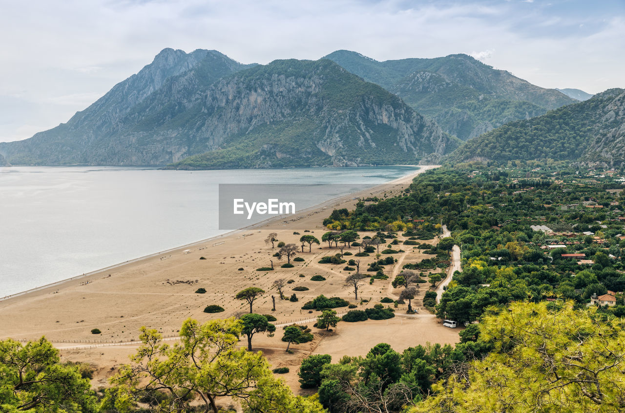 Scenic view of beach and mountains