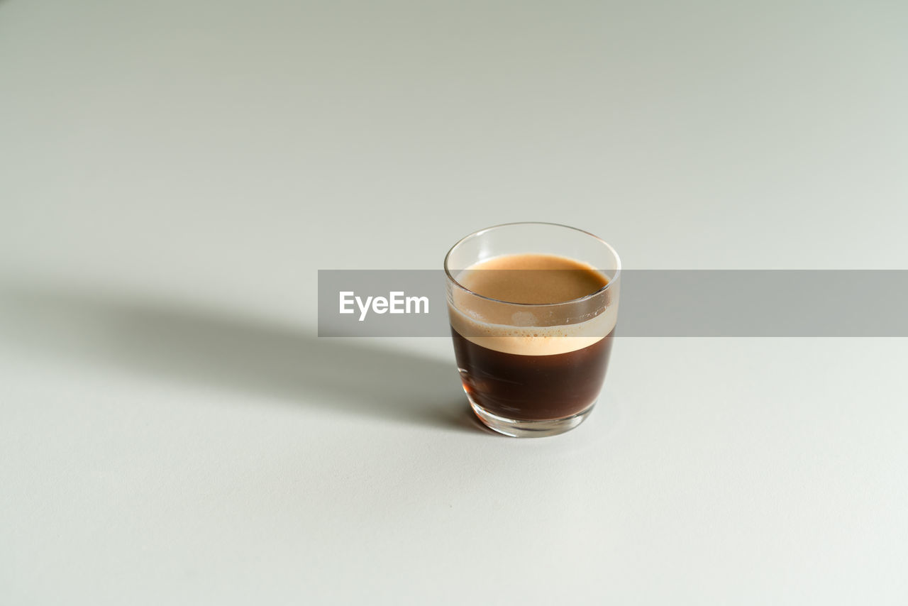 Close-up of espresso in cup on table