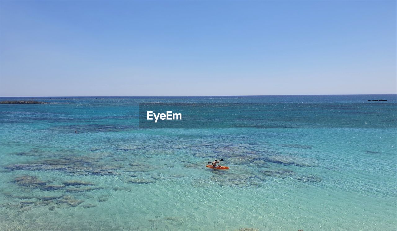 VIEW OF SEA AGAINST CLEAR BLUE SKY