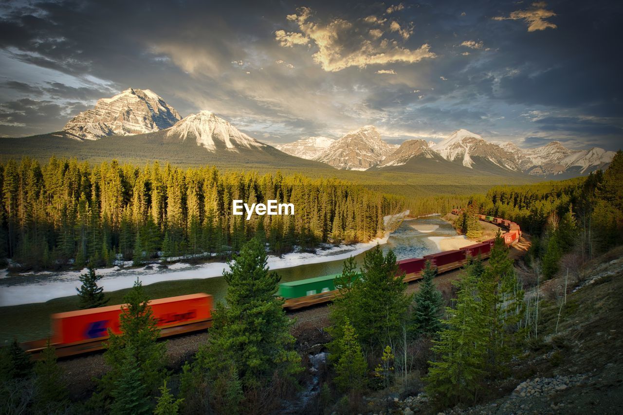 Cp rail traveling through morant's curve in banff national park 