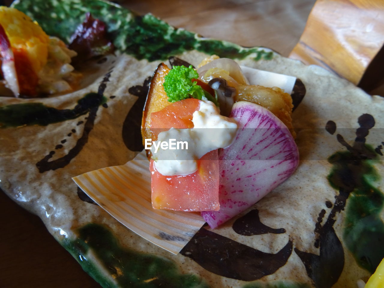 Close-up of food served on table