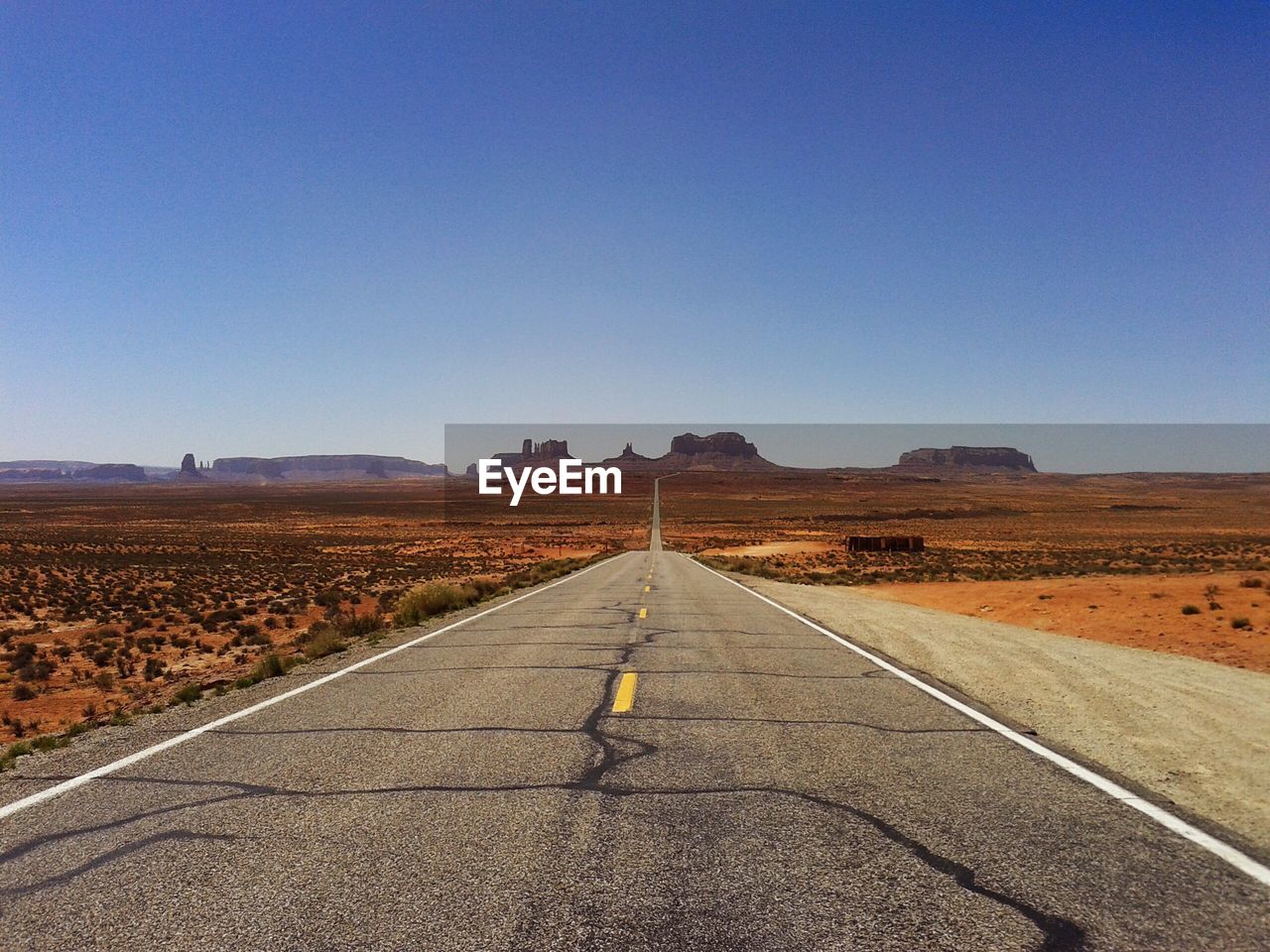 Road against clear sky