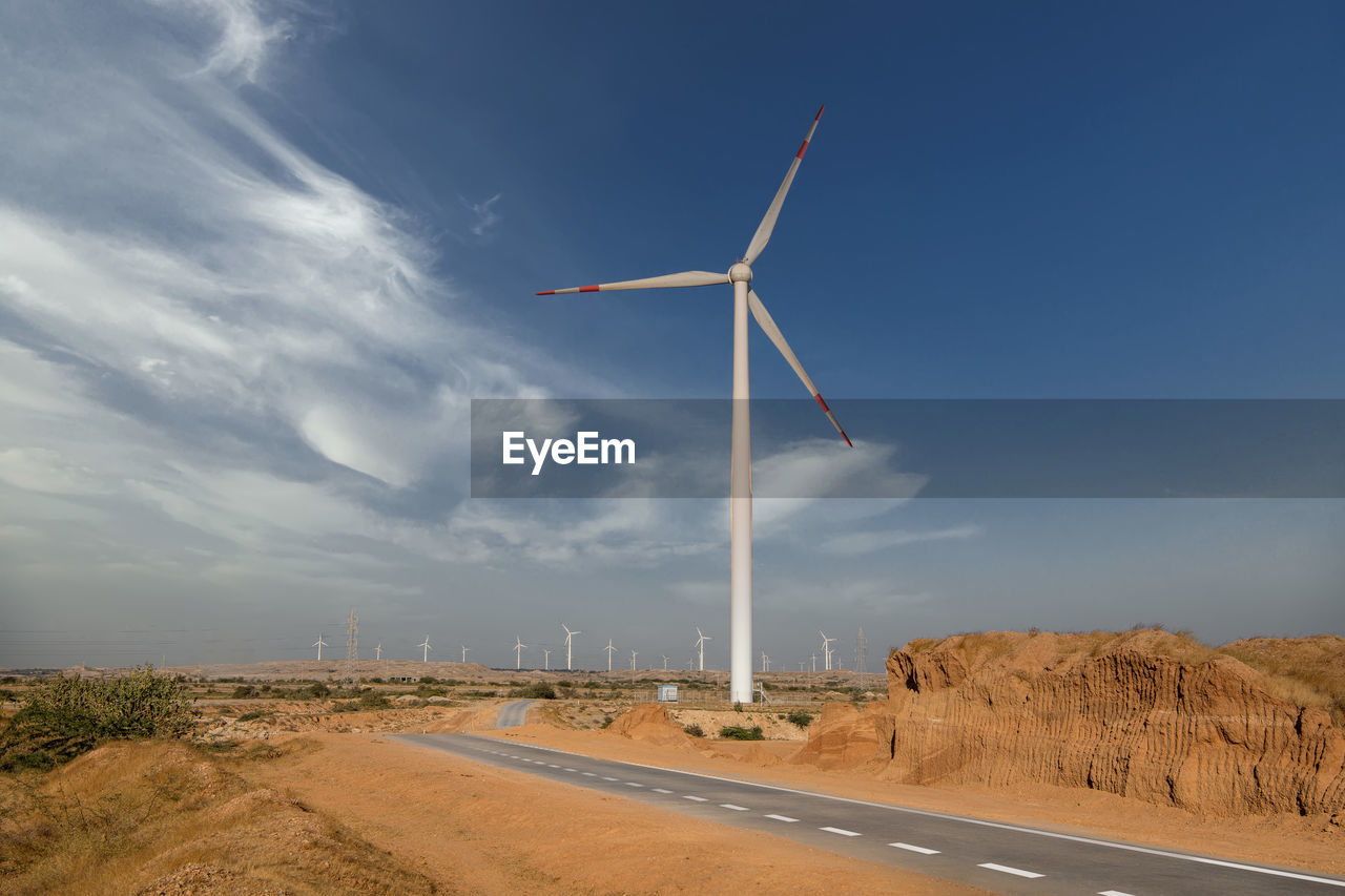 View of wind power plant. vast turbine wind mills farm at jhimpir