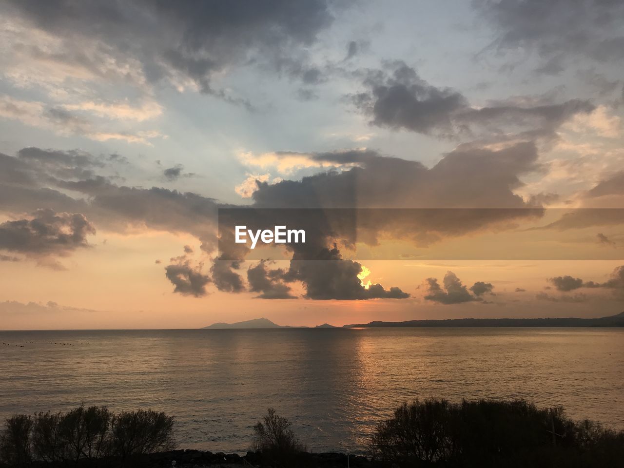 SCENIC VIEW OF SEA DURING SUNSET