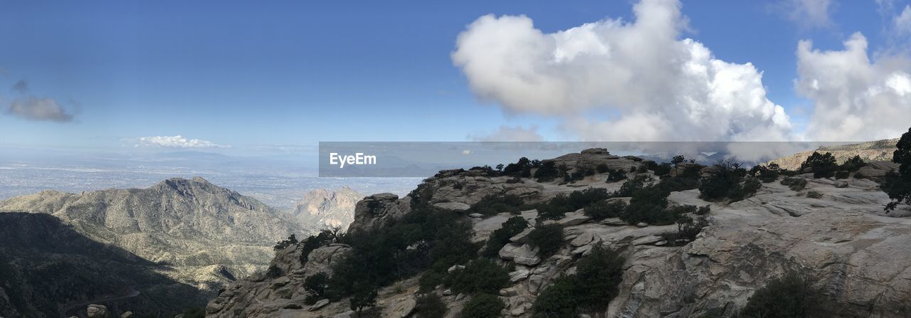 PANORAMIC VIEW OF MOUNTAINS AGAINST SKY