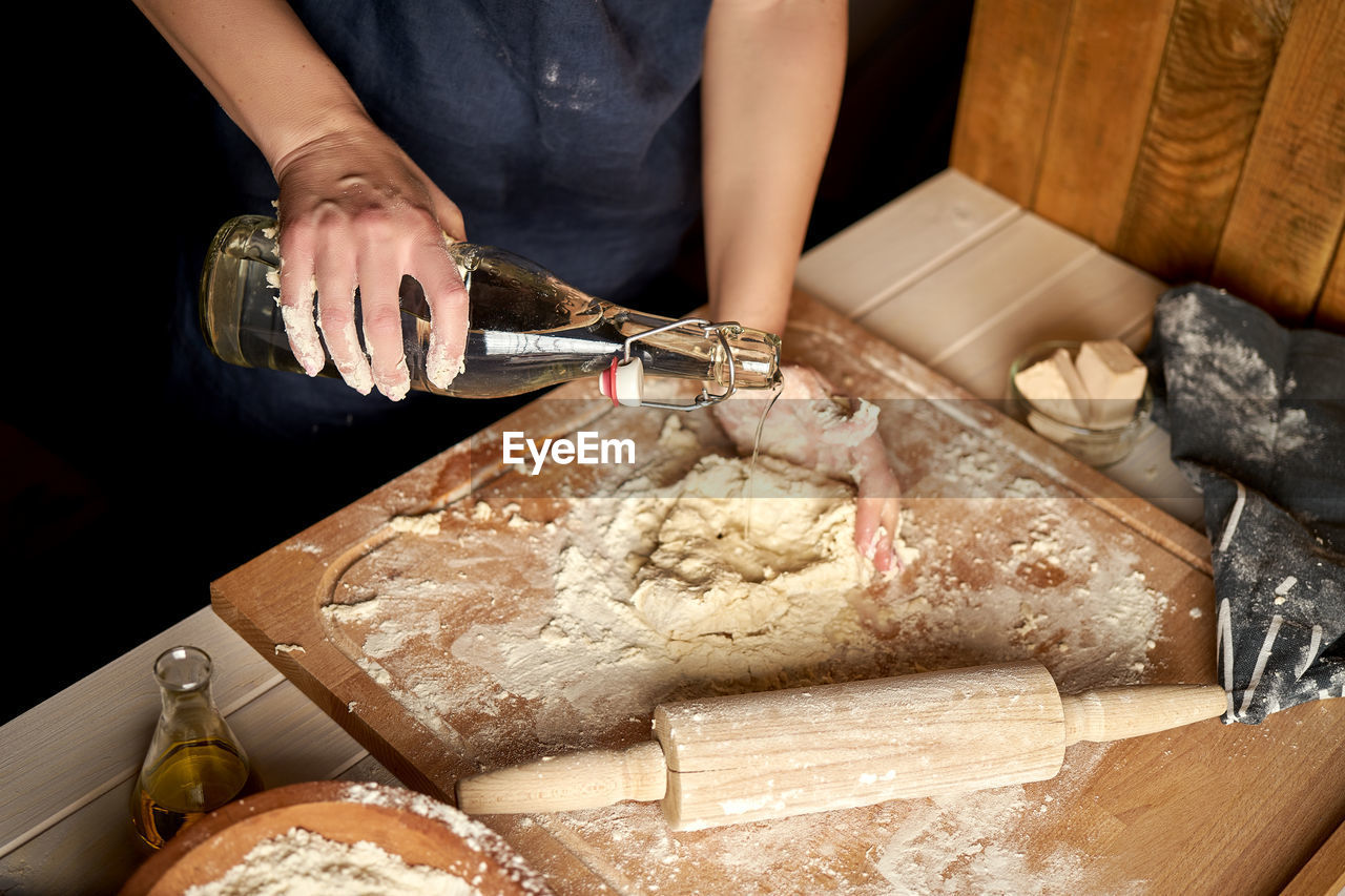 Midsection of woman preparing food