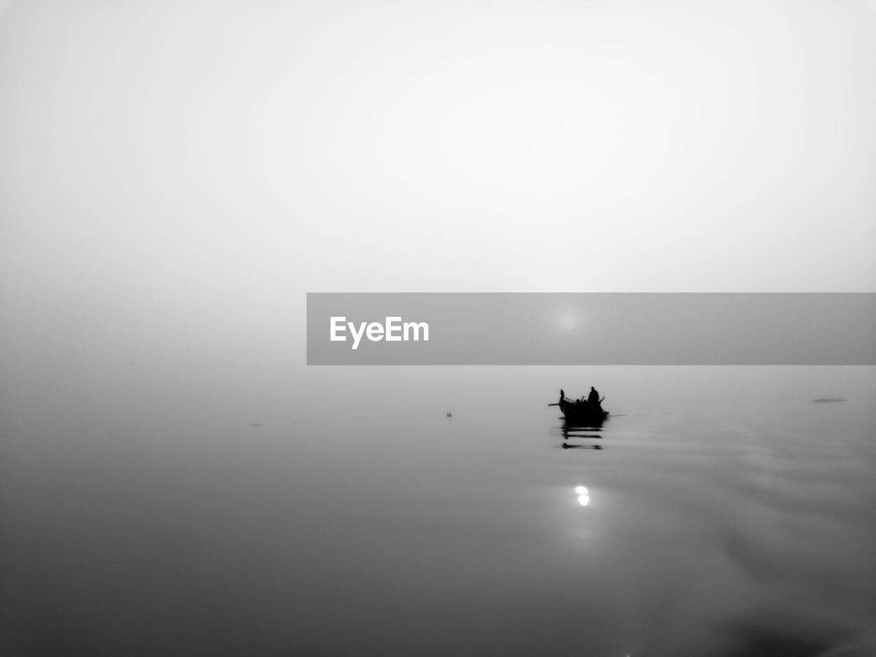 water, fog, tranquility, transportation, nature, nautical vessel, silhouette, copy space, reflection, mode of transportation, sea, tranquil scene, sky, scenics - nature, mist, beauty in nature, horizon, no people, outdoors, black and white, day, morning, waterfront, ship, vehicle, darkness, light, monochrome, travel