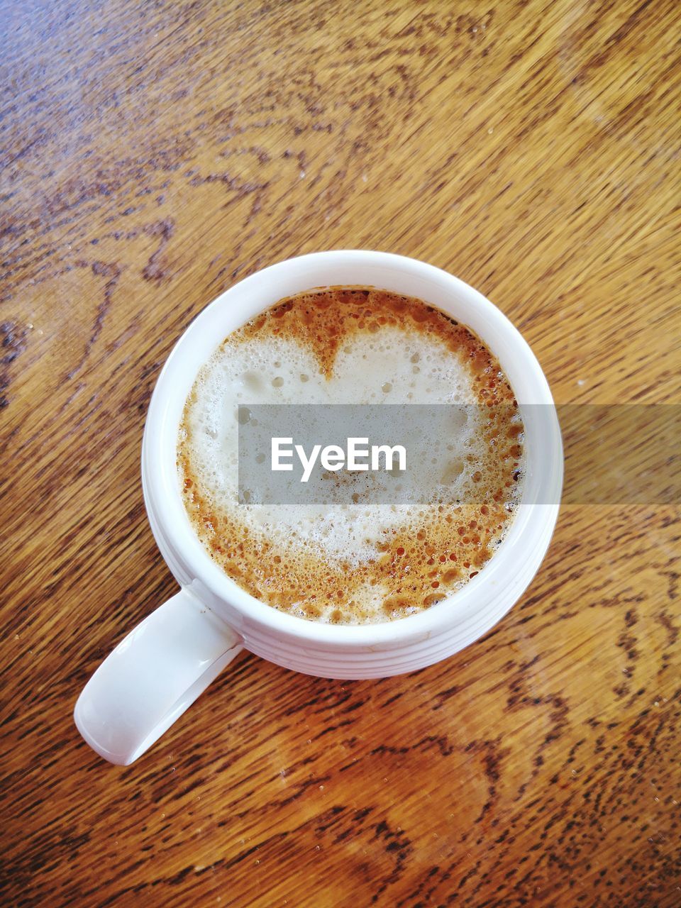 CLOSE-UP OF COFFEE ON TABLE