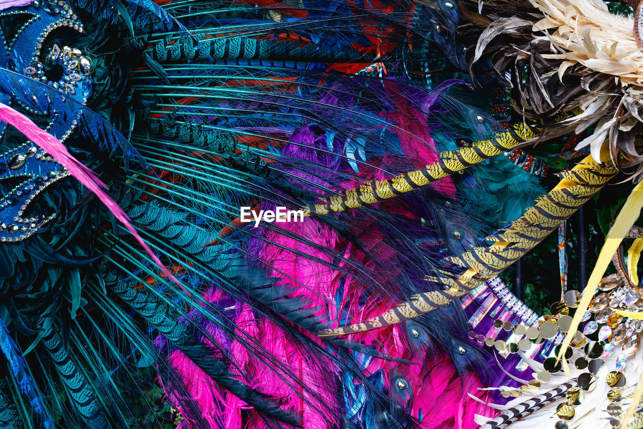 Full frame shot of colorful feathers for sale at market