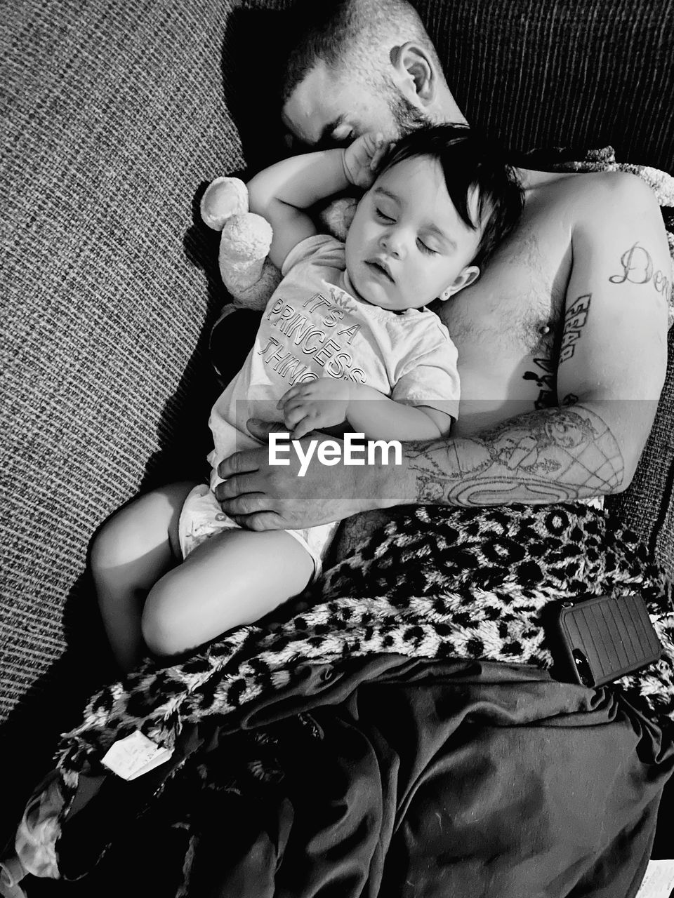 black and white, child, childhood, monochrome photography, person, family, baby, adult, togetherness, two people, monochrome, women, female, parent, indoors, love, furniture, sitting, emotion, men, positive emotion, photo shoot, bonding, black, relaxation, lifestyles, portrait photography, sleeping, one parent, full length, portrait, cute, toddler, babyhood, sofa, embracing, innocence, eyes closed, bed, clothing, lying down, home interior, happiness, care, high angle view, human face, father, leisure activity