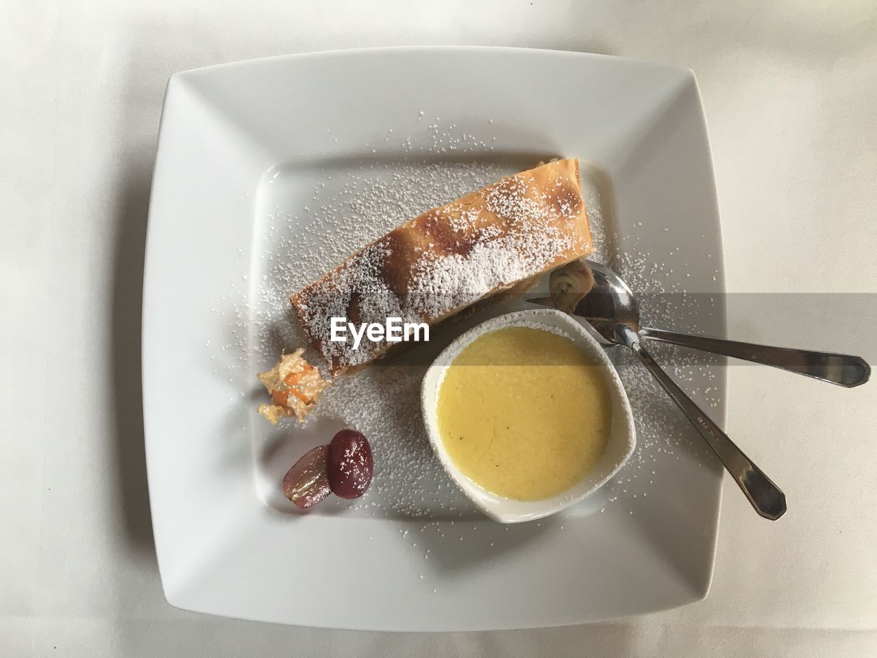 Directly above shot of apple strudel in plate on table