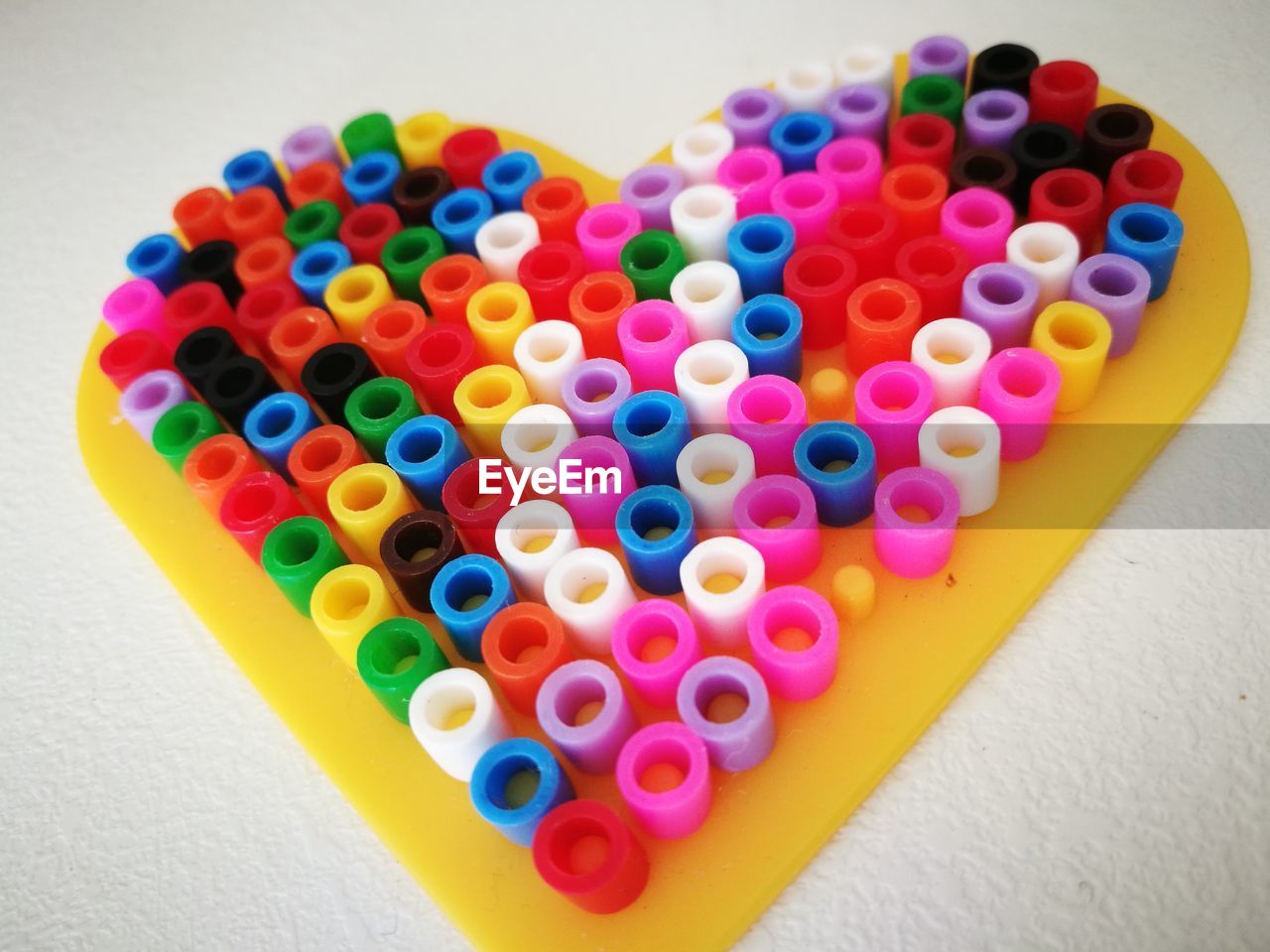 CLOSE-UP OF COLORFUL BALLOONS ON TABLE