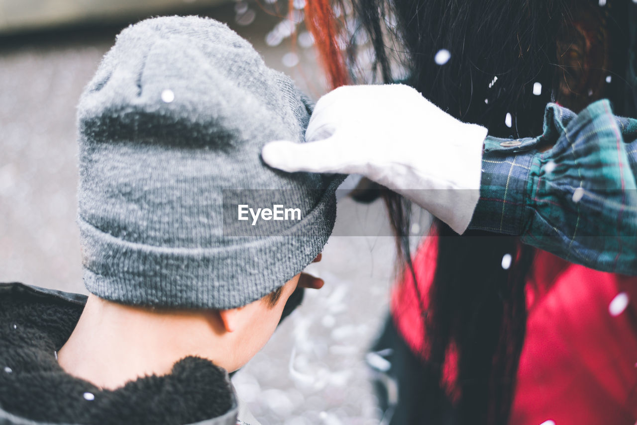 CLOSE-UP OF FRIENDS ON SNOW