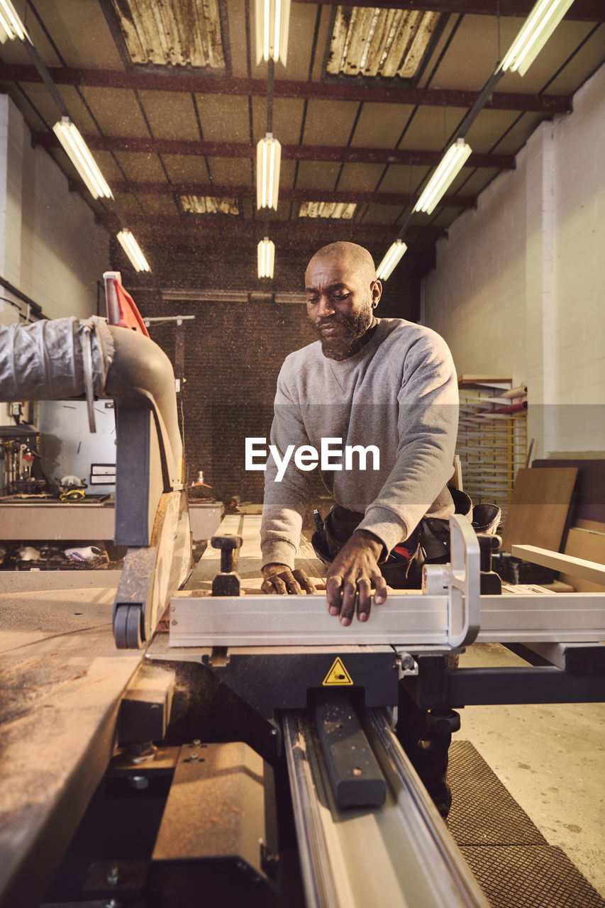 Carpenter working at workshop