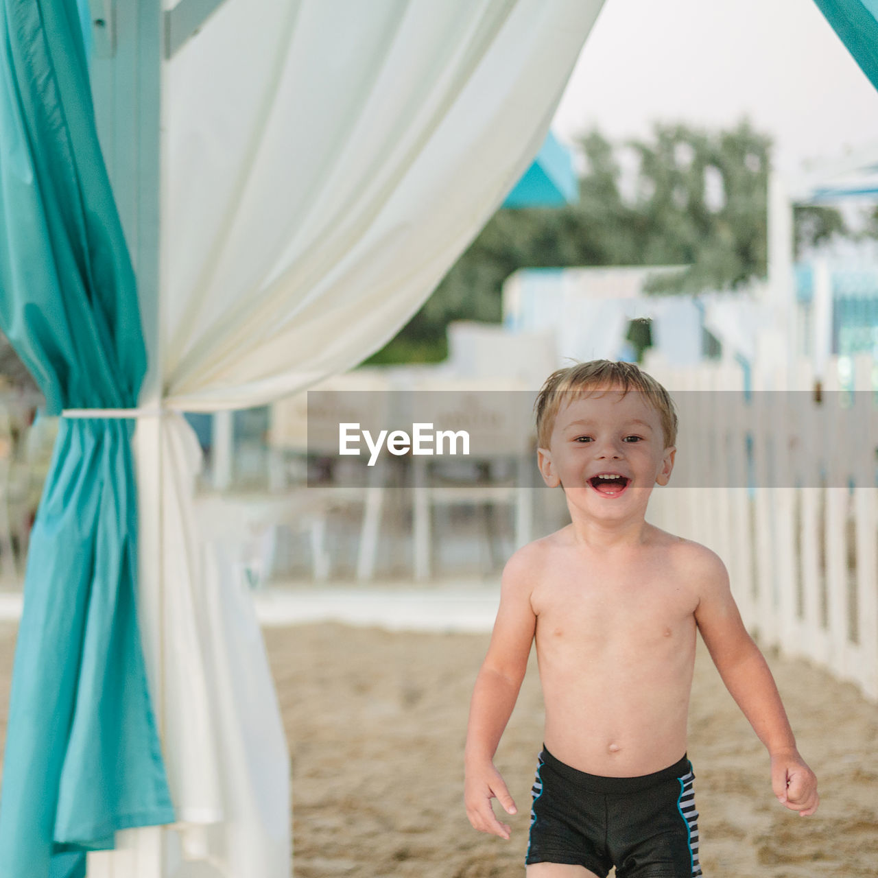 Portrait of smiling boy on beach