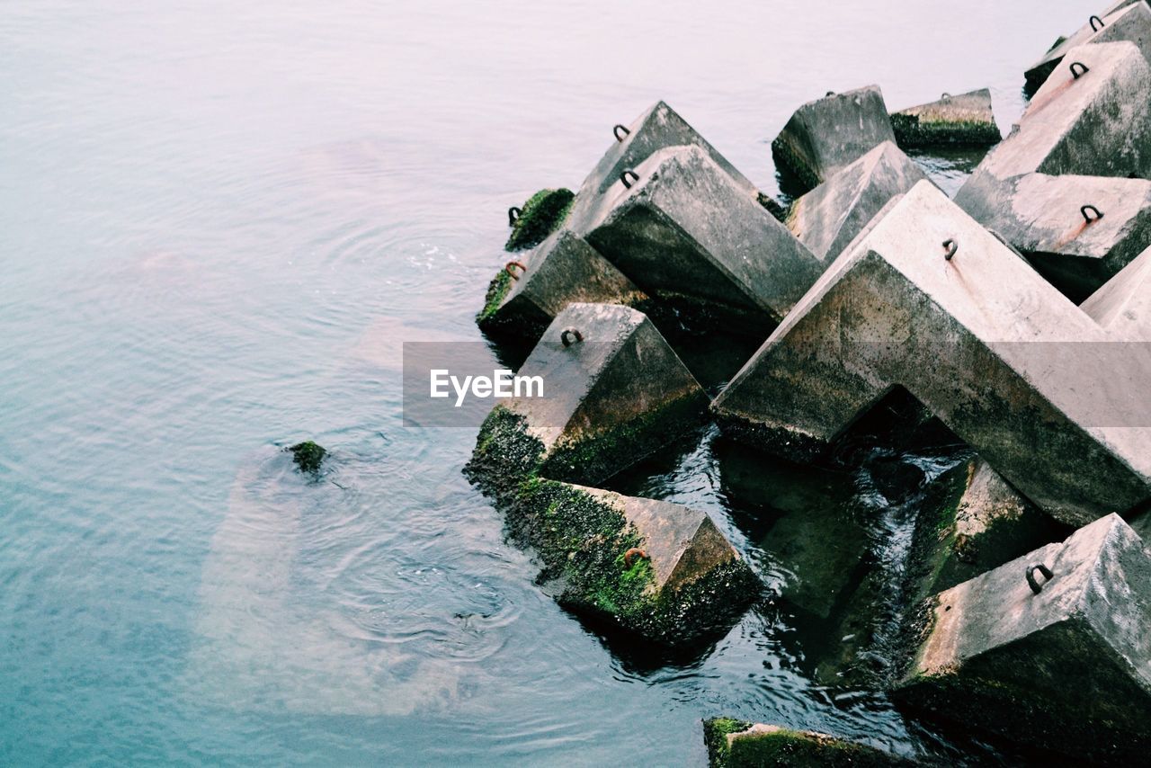 High angle view of rocks at lake