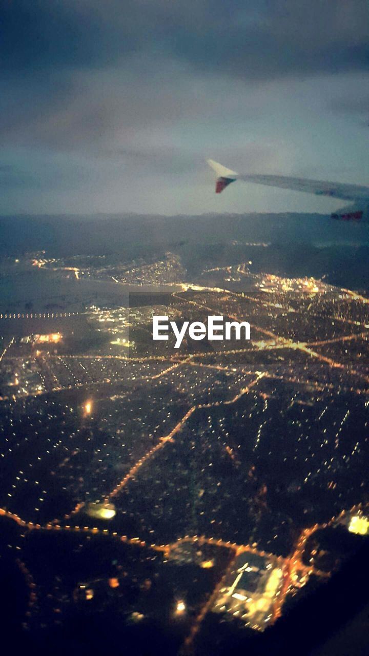 AERIAL VIEW OF CITYSCAPE AGAINST SKY